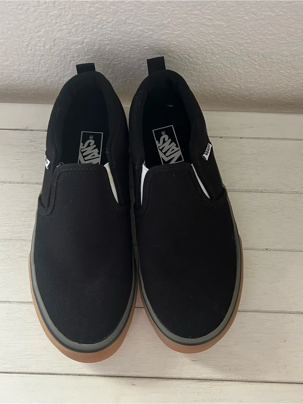 Vans Black Slip-On Sneakers with Gum Sole
